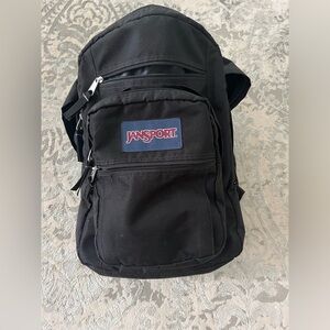 Black Backpack with multiple pockets.